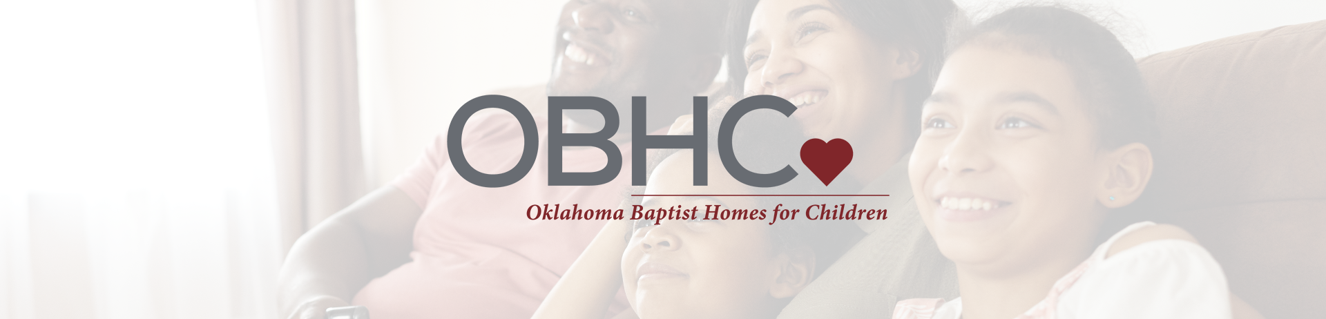 OBHC logo with photo of happy family on couch in background